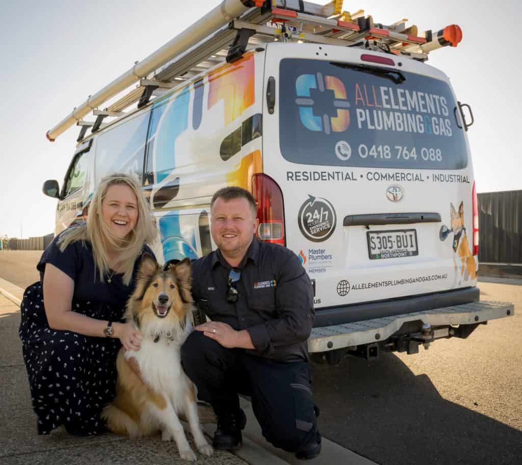 Alyssa and Ben Hall with dog millie and service van