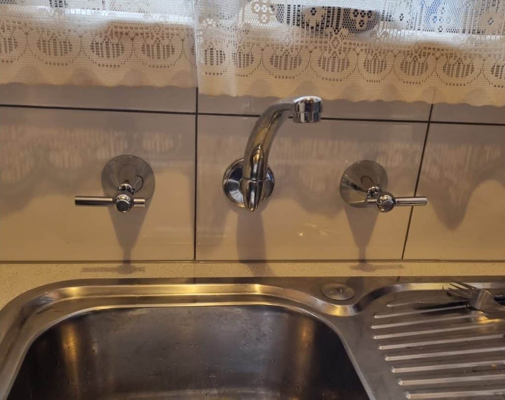 faucet of metal sink