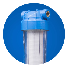 A water filter cartridge with a transparent lower section and a blue top, set against a plain blue background.